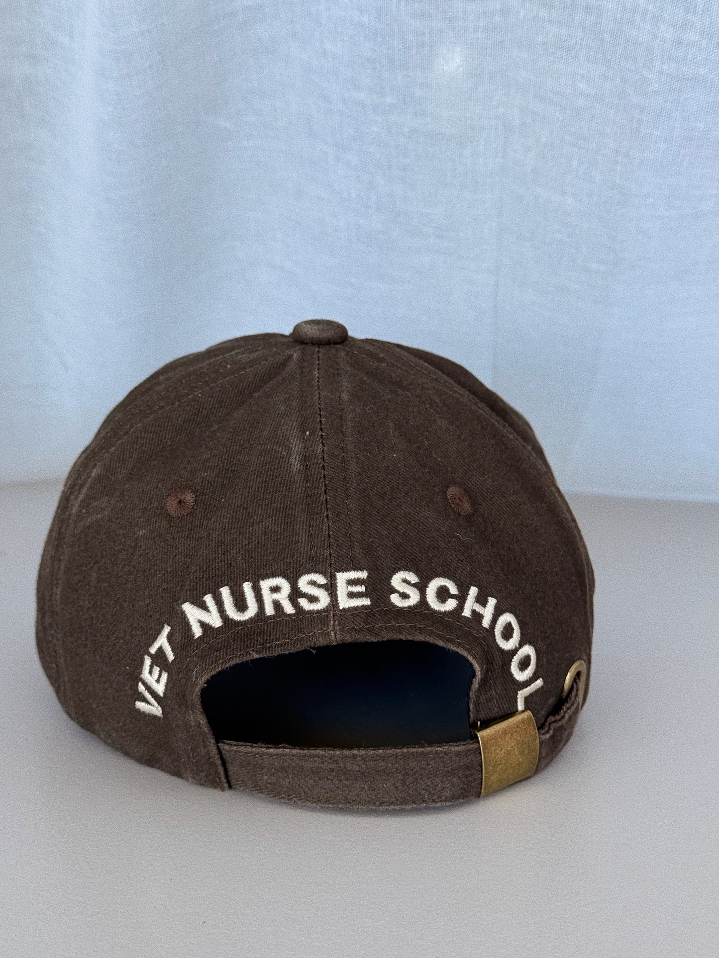 Helping Animals & Causing Problems Brown Dad Hat