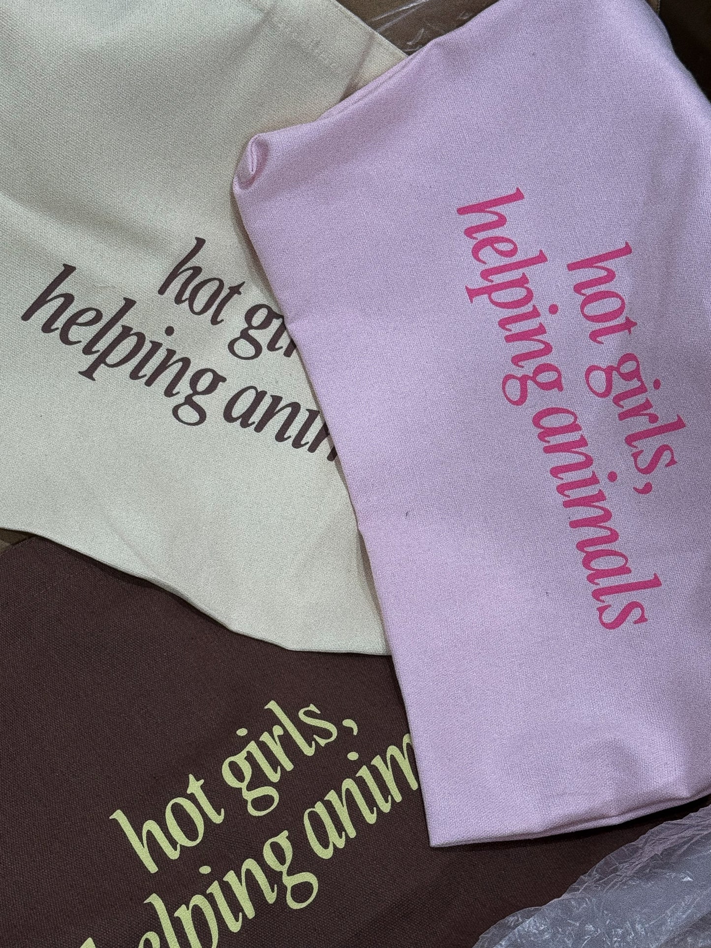 Hot Girls Helping Animals Cream Tote